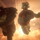 Peacemaker and Leota (Danielle Brooks) are launched through the air by a fiery explosion.